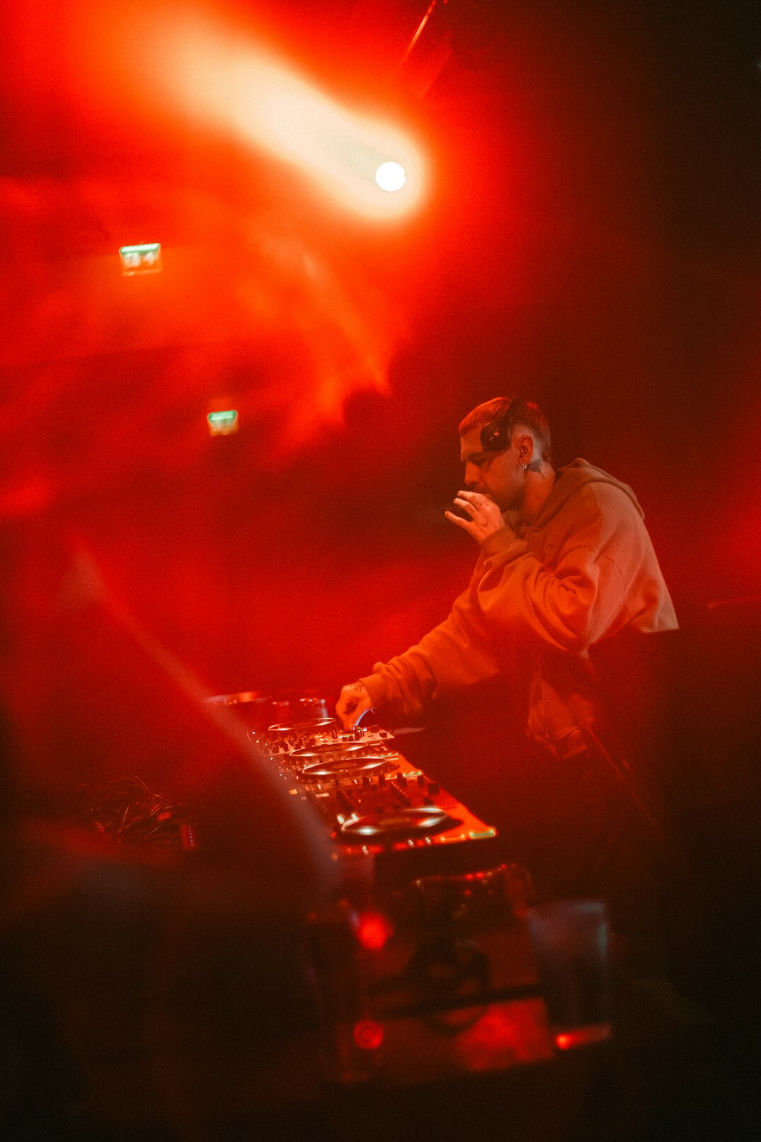 Audio engineer working at a broadcast sound mixing desk